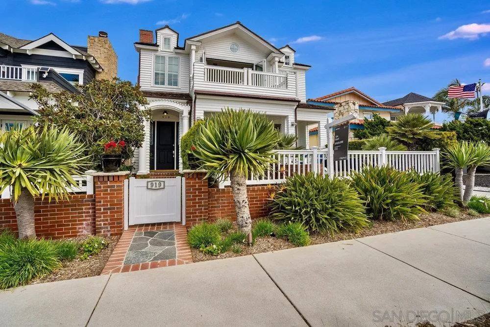 919 Ocean Boulevard Coronado, CA 92118 - Photo 58 of 63 a front view of a house with a garden