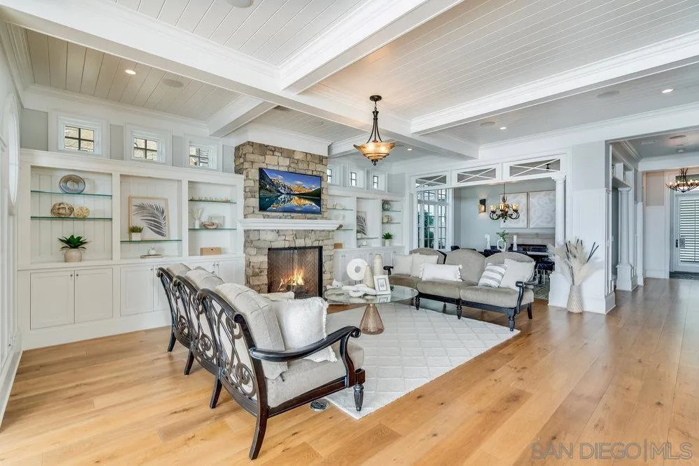 919 Ocean Boulevard Coronado, CA 92118 - Photo 6 of 63 a living room with furniture a fireplace and a flat screen tv