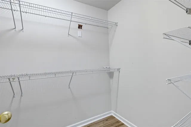 a view of a room with racks on the wall