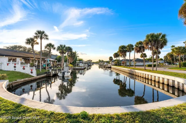 a view of swimming pool from a balcony