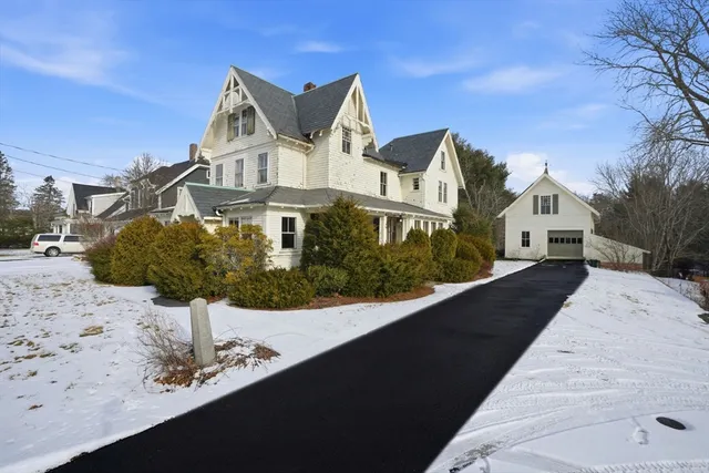 a front view of a house with yard