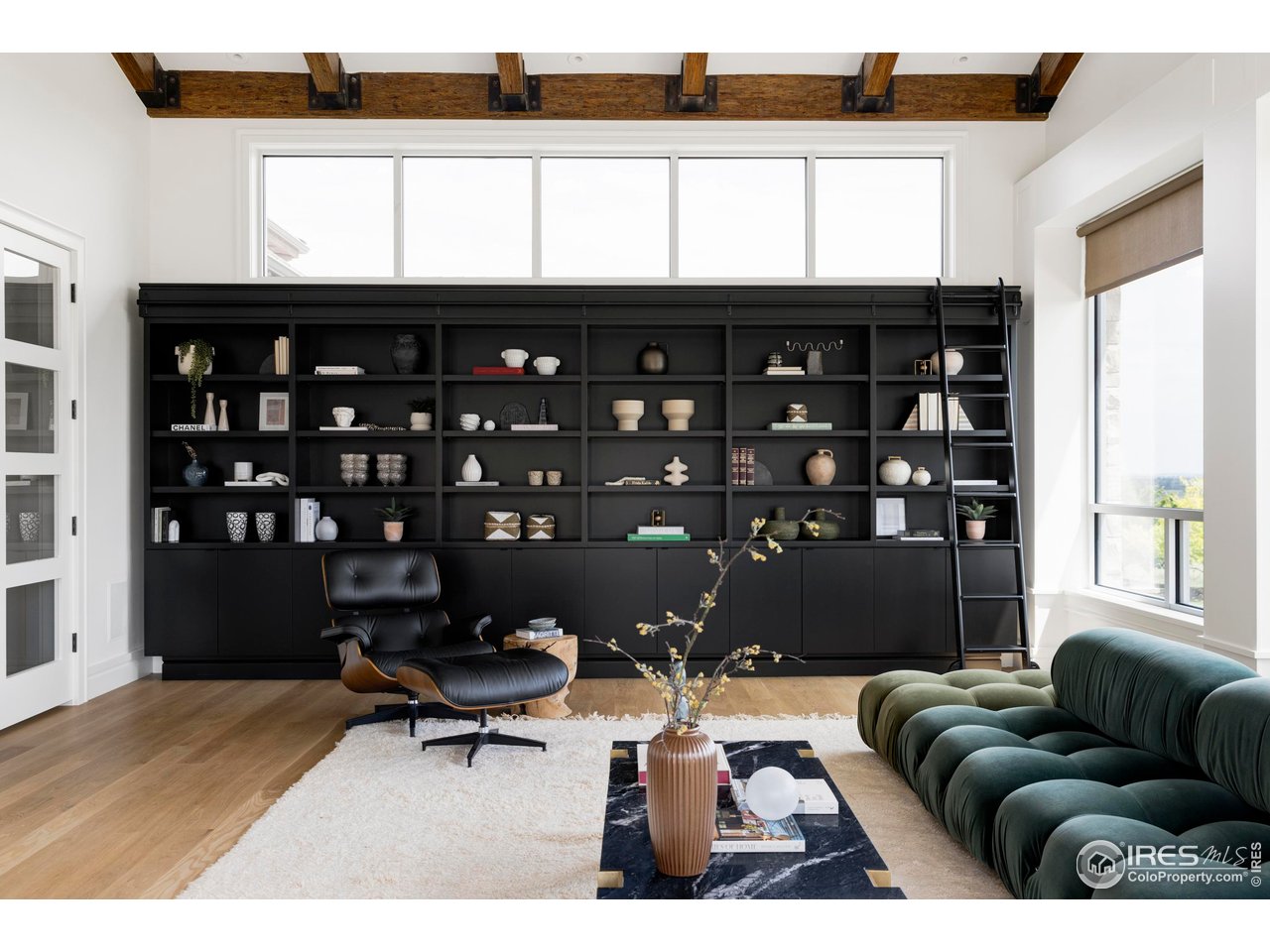6880 St Vrain Road Longmont, CO 80503 - Photo 12 of 37 a living room with furniture and a window