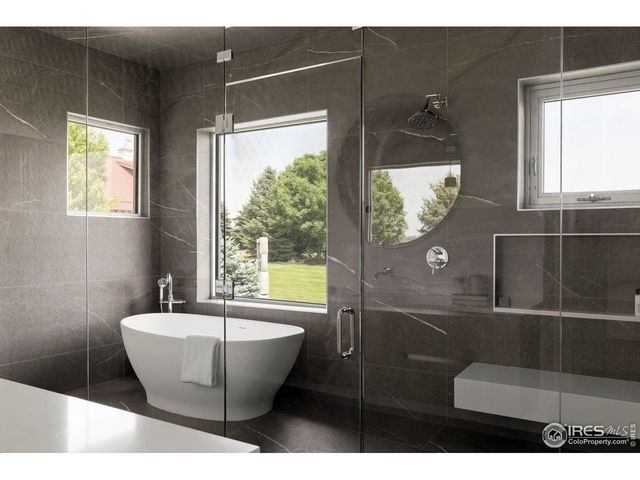 a view of a bathtub in a bathroom