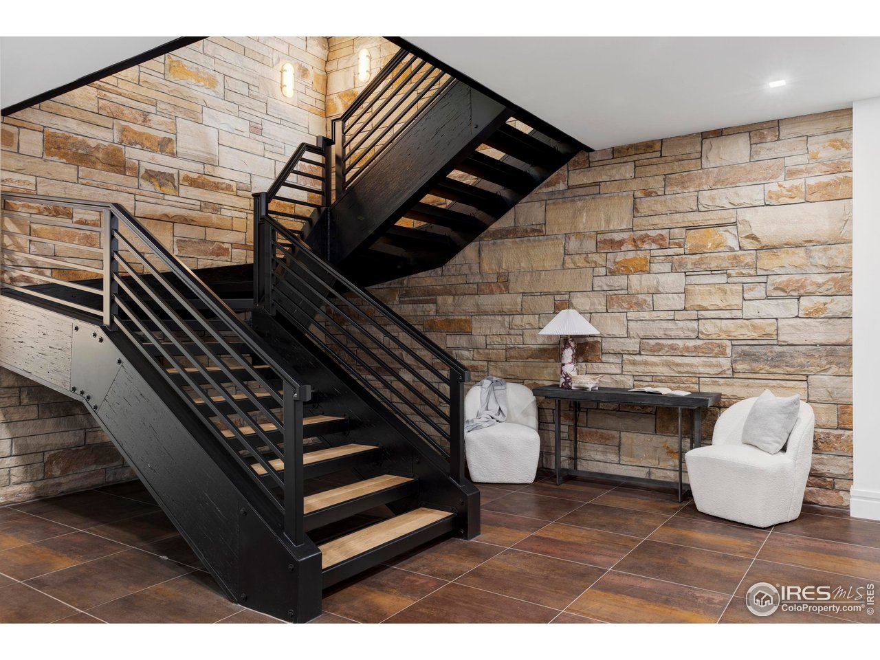 6880 St Vrain Road Longmont, CO 80503 - Photo 20 of 37 a view of an entryway with wooden floor