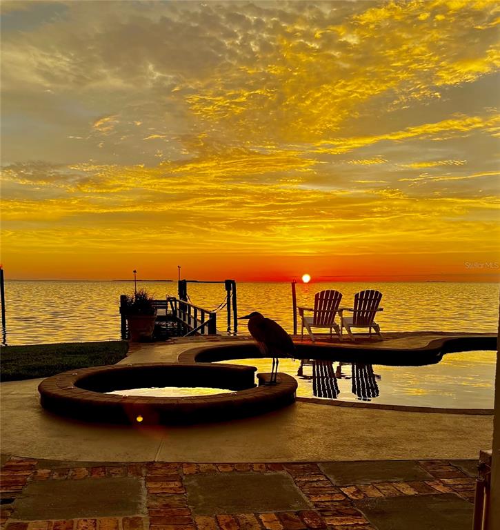 a view of a ocean with a nearby beach