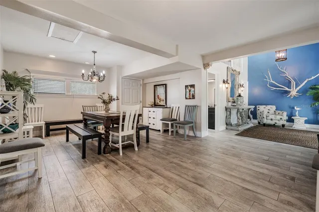 a large kitchen with stainless steel appliances granite countertop a stove and a sink