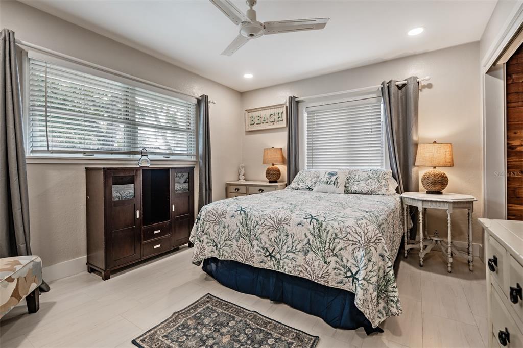 615 North Mayo Street Palm Harbor, FL 34683 - Photo 34 of 73 a bedroom with a bed and a dresser