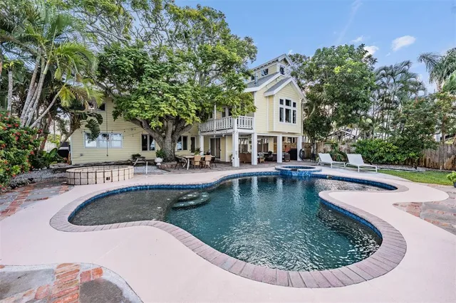 a view of a golf course with a lake view