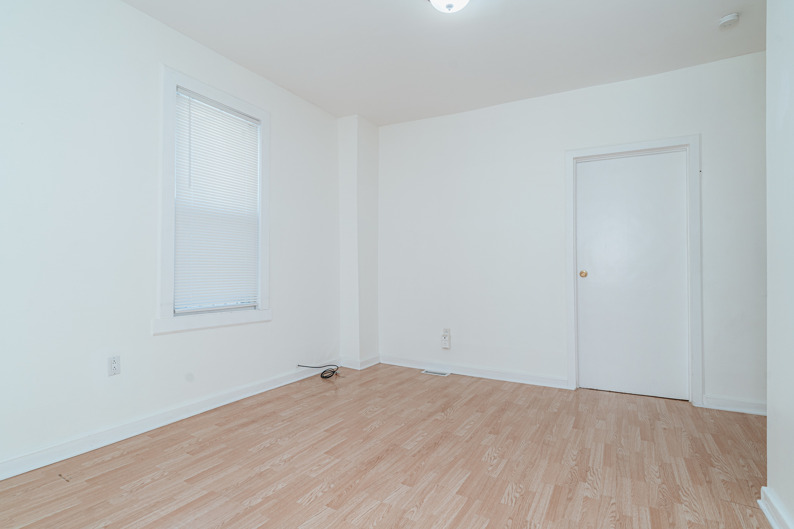747 North Throop Street Chicago, IL 60642 - Photo 12 of 31 a view of empty room with wooden floor