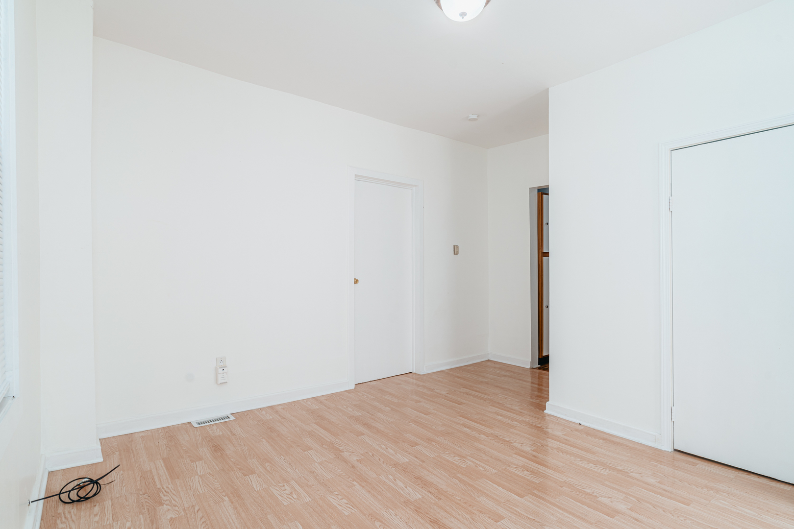 747 North Throop Street Chicago, IL 60642 - Photo 13 of 31 a view of a room with wooden floor