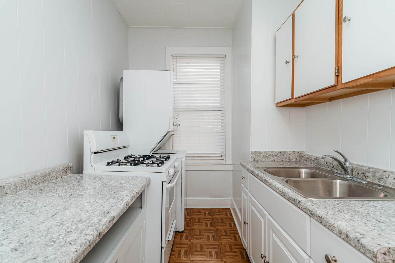 747 North Throop Street Chicago, IL 60642 - Photo 14 of 31 a kitchen that has a sink and a stove