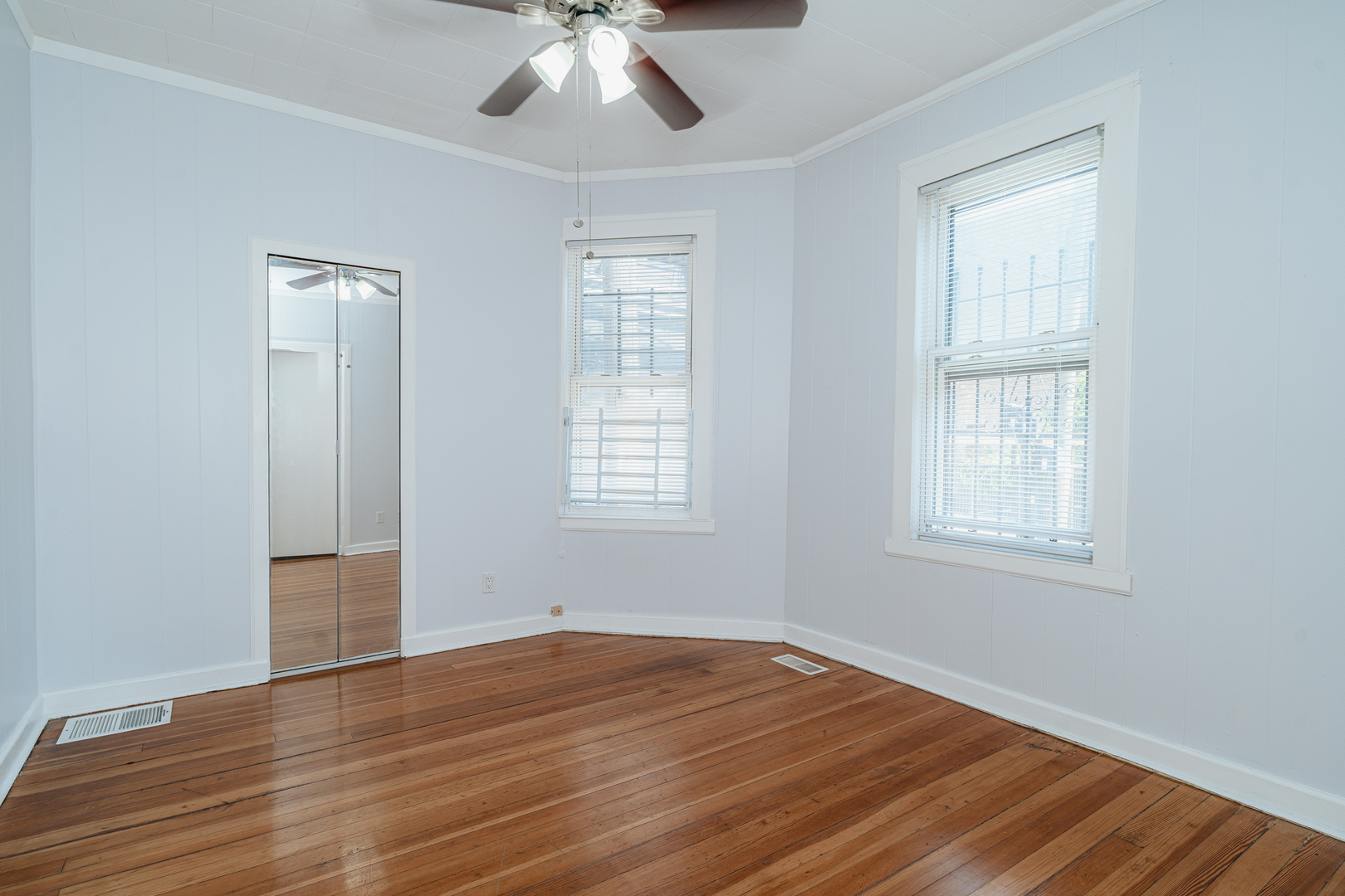 747 North Throop Street Chicago, IL 60642 - Photo 15 of 31 wooden floor in an empty room with a window