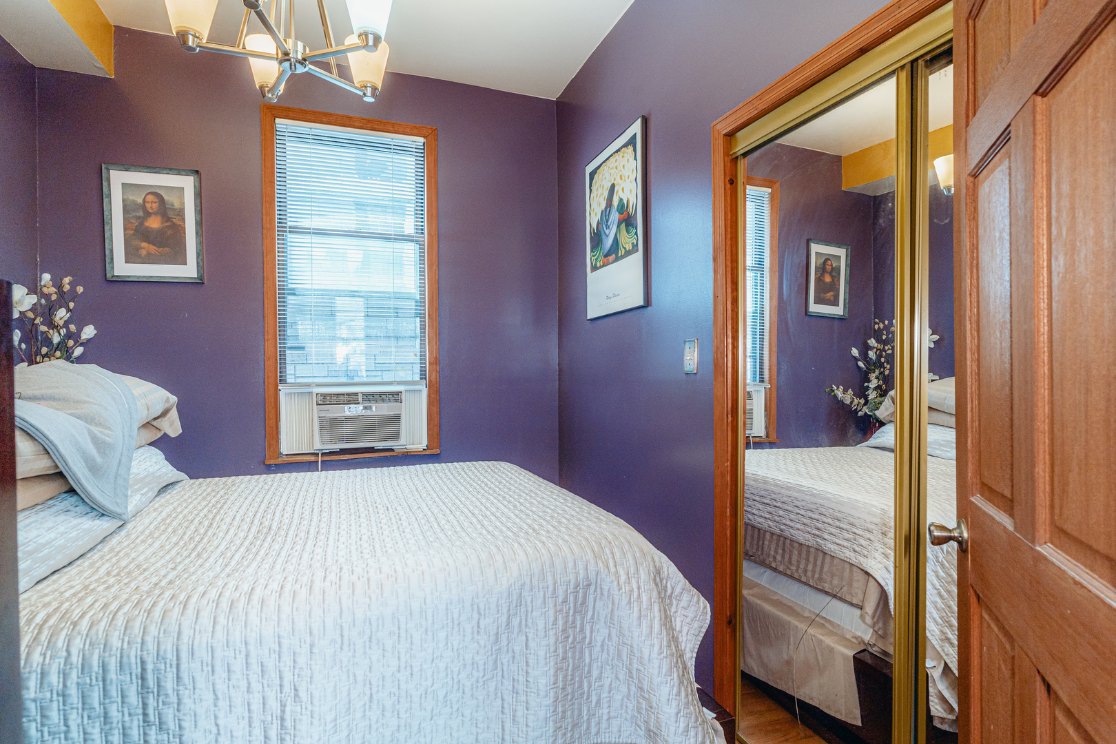 747 North Throop Street Chicago, IL 60642 - Photo 18 of 31 a bedroom with a bed and a window