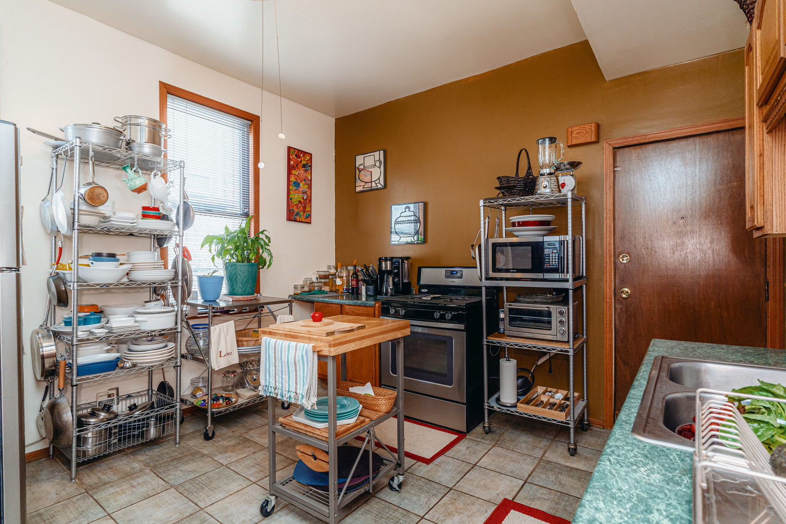 747 North Throop Street Chicago, IL 60642 - Photo 20 of 31 a room with furniture a rug and a window