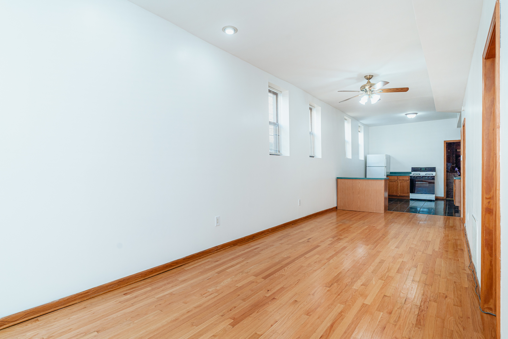 747 North Throop Street Chicago, IL 60642 - Photo 7 of 31 a view of livingroom with furniture and wooden floor