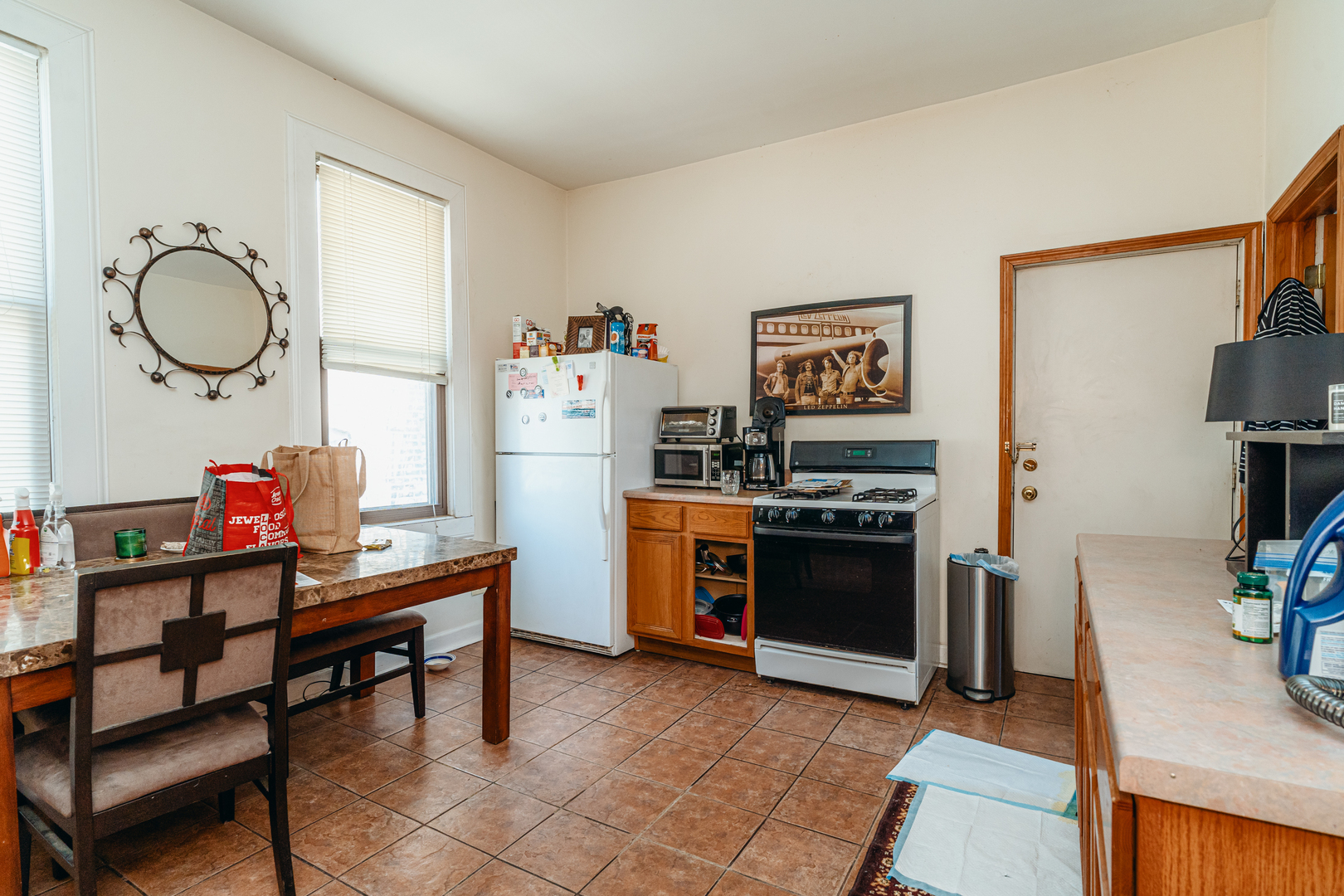 747 North Throop Street Chicago, IL 60642 - Photo 10 of 31 a view of kitchen with furniture and wooden floor