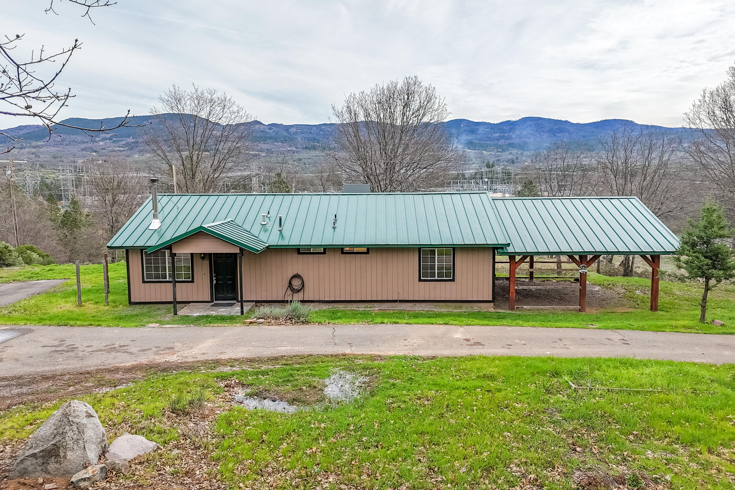 29800 Ranch Road Montgomery Creek, CA 96065 - Photo 59 of 74 a house with a garden in front of it