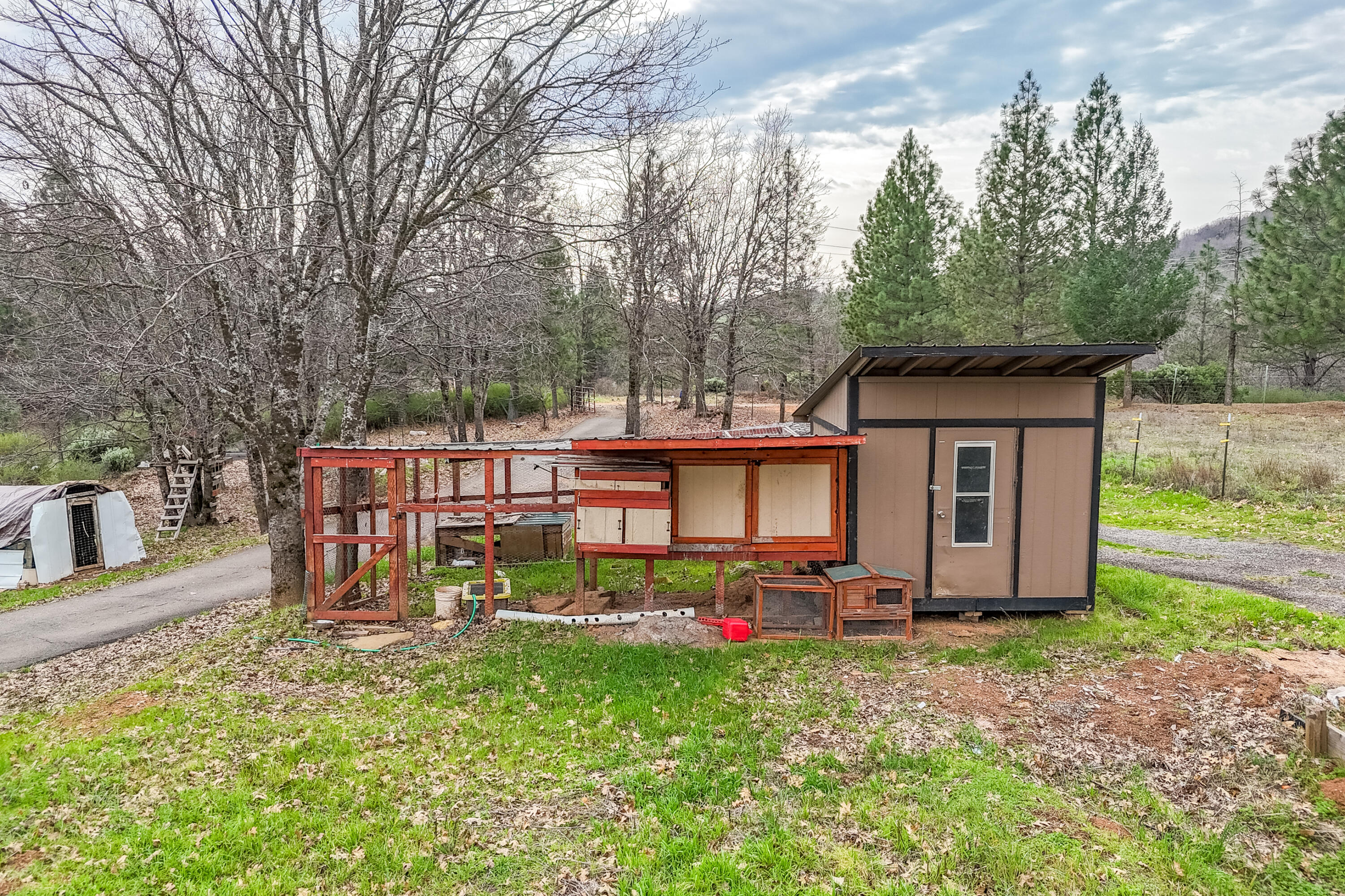 29800 Ranch Road Montgomery Creek, CA 96065 - Photo 67 of 74 a view of a house with backyard and sitting area