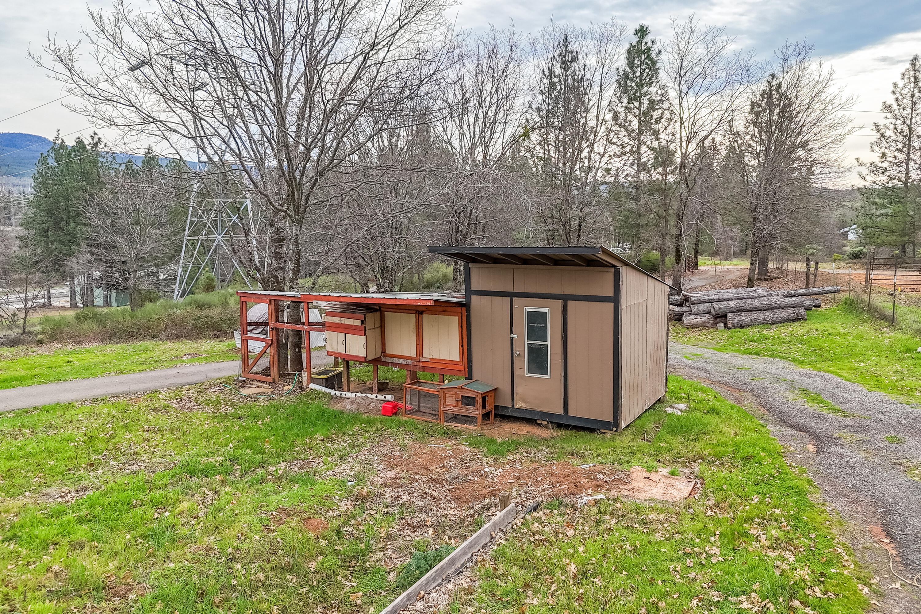 29800 Ranch Road Montgomery Creek, CA 96065 - Photo 68 of 74 a view of backyard with wooden fence and large trees