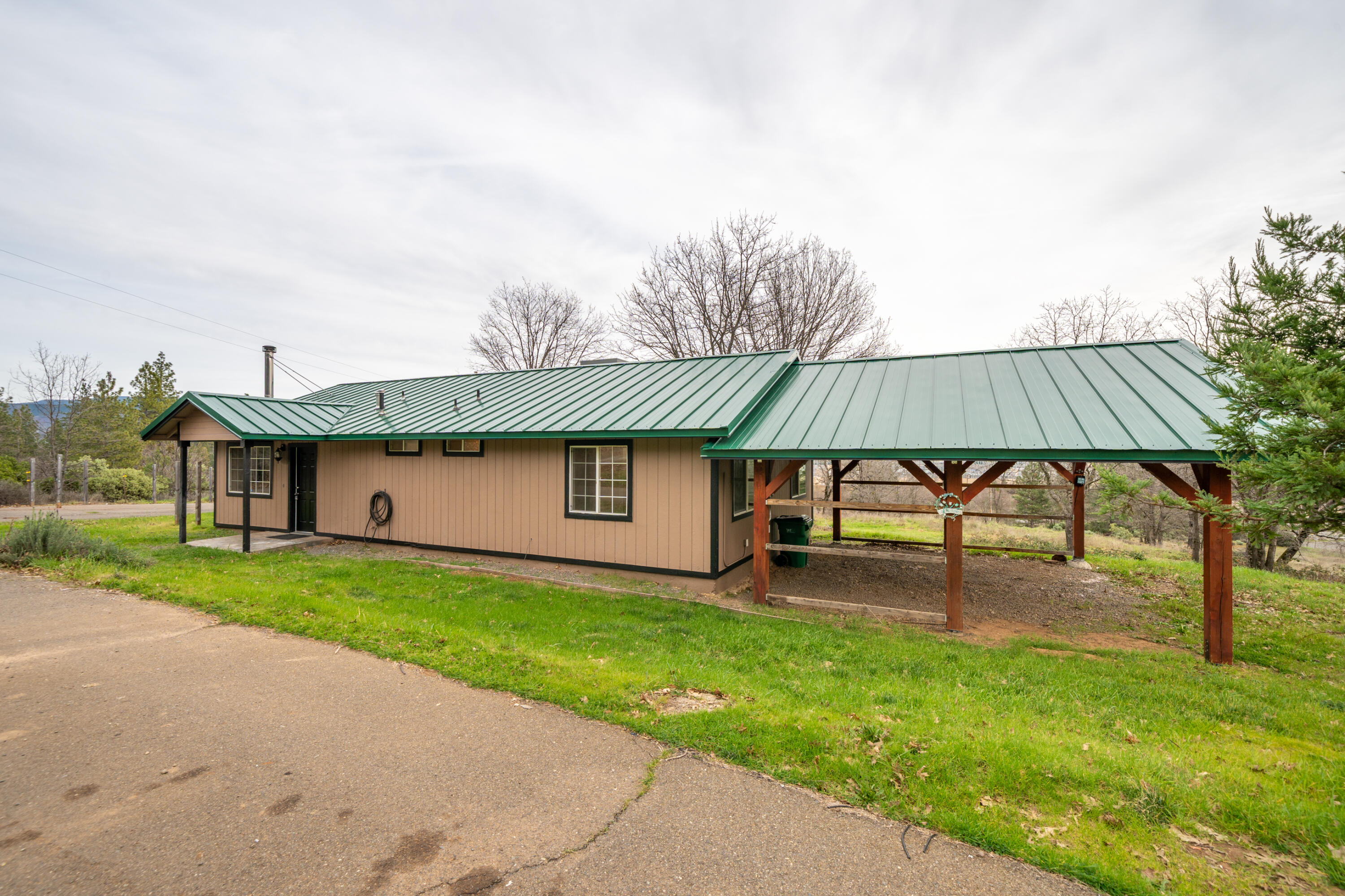 29800 Ranch Road Montgomery Creek, CA 96065 - Photo 8 of 74 a backyard of a house with table and chairs