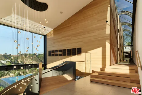 a view of swimming pool with seating area and furniture