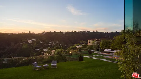 a view of a building with a big yard