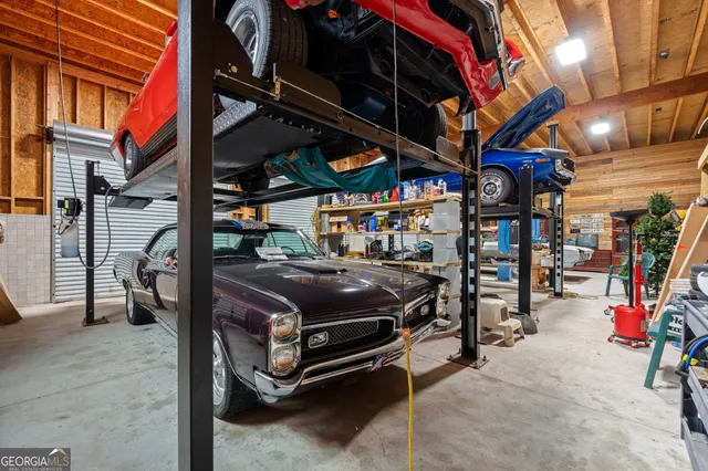 a room with gym equipment and a mirror