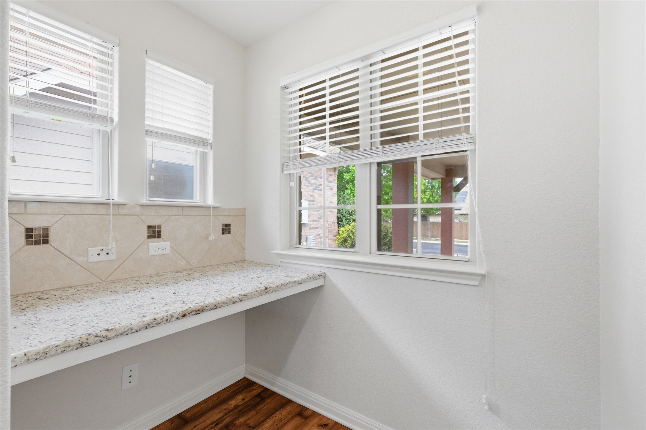 339 Sycamore Street Georgetown, TX 78633 - Photo 18 of 28 Unfurnished office with dark wood-style flooring and plenty of natural light