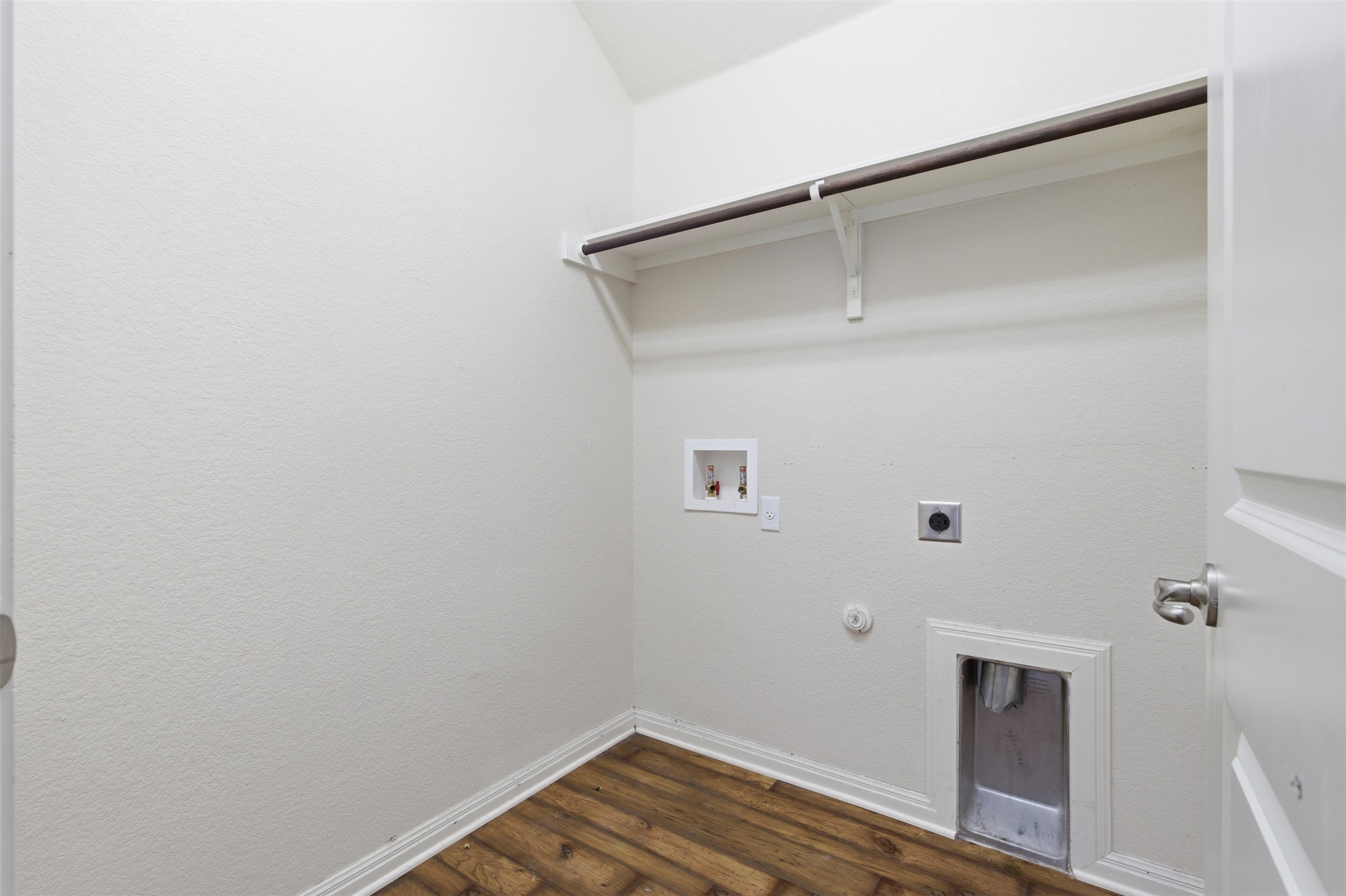 339 Sycamore Street Georgetown, TX 78633 - Photo 22 of 28 Laundry room featuring hookup for a gas dryer, dark wood-style floors, electric dryer hookup, and washer hookup