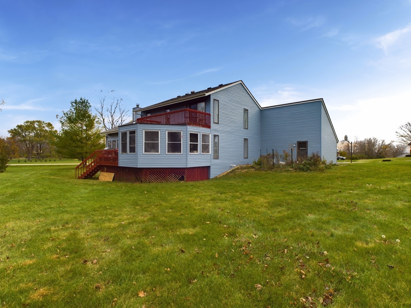 15840 Overlook Lane Huntley, IL 60142 - Photo 32 of 42 a view of a house with a backyard
