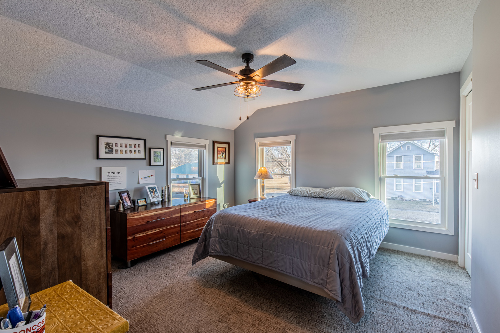 220 2nd Street Wyanet, IL 61379 - Photo 14 of 27 a bedroom with a bed and a chandelier