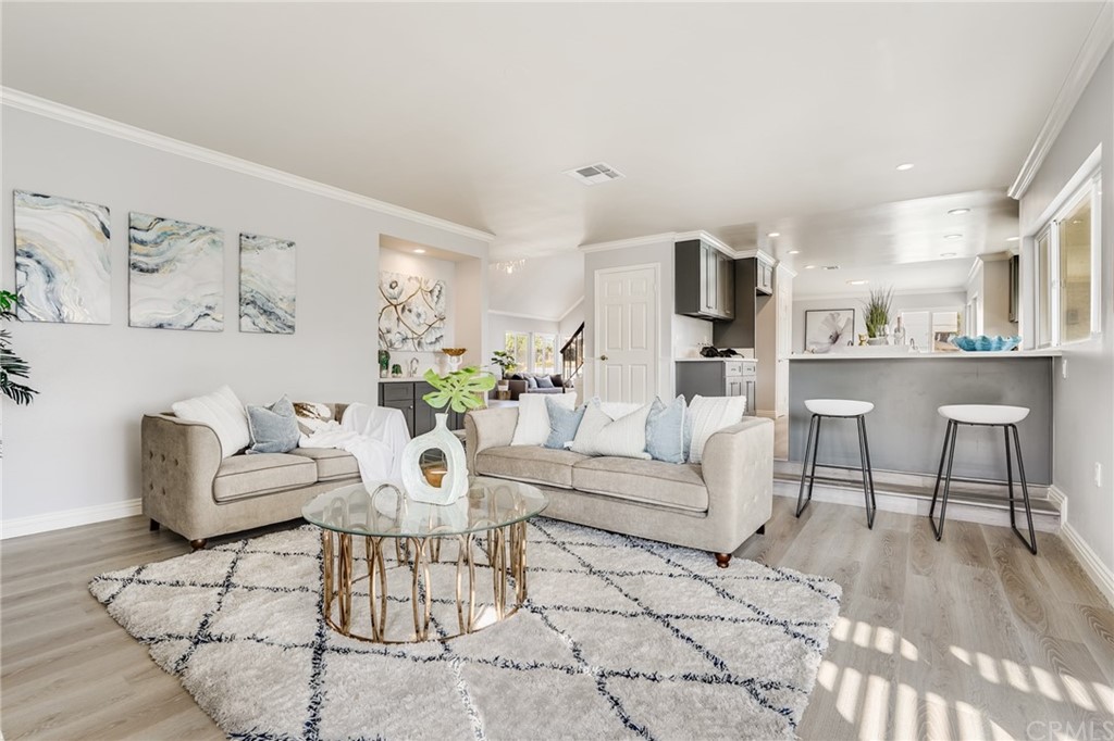 21626 Fairwind Lane Diamond Bar, CA 91765 - Photo 13 of 44 a living room with furniture and a wooden floor
