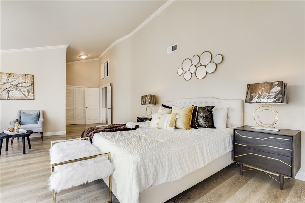 21626 Fairwind Lane Diamond Bar, CA 91765 - Photo 25 of 44 a bedroom with a bed and a table with rug