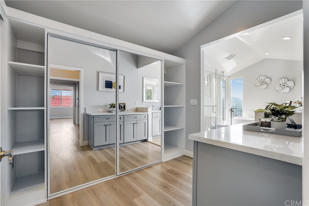 21626 Fairwind Lane Diamond Bar, CA 91765 - Photo 26 of 44 a bedroom with a bed and wooden floor