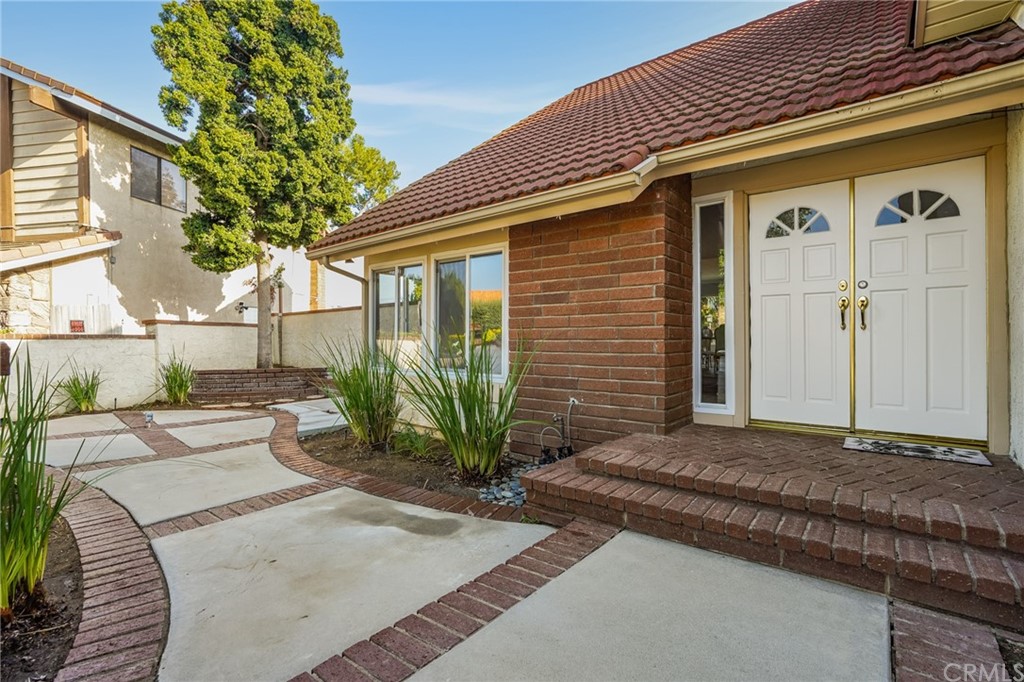 21626 Fairwind Lane Diamond Bar, CA 91765 - Photo 43 of 44 a front view of a house with garden