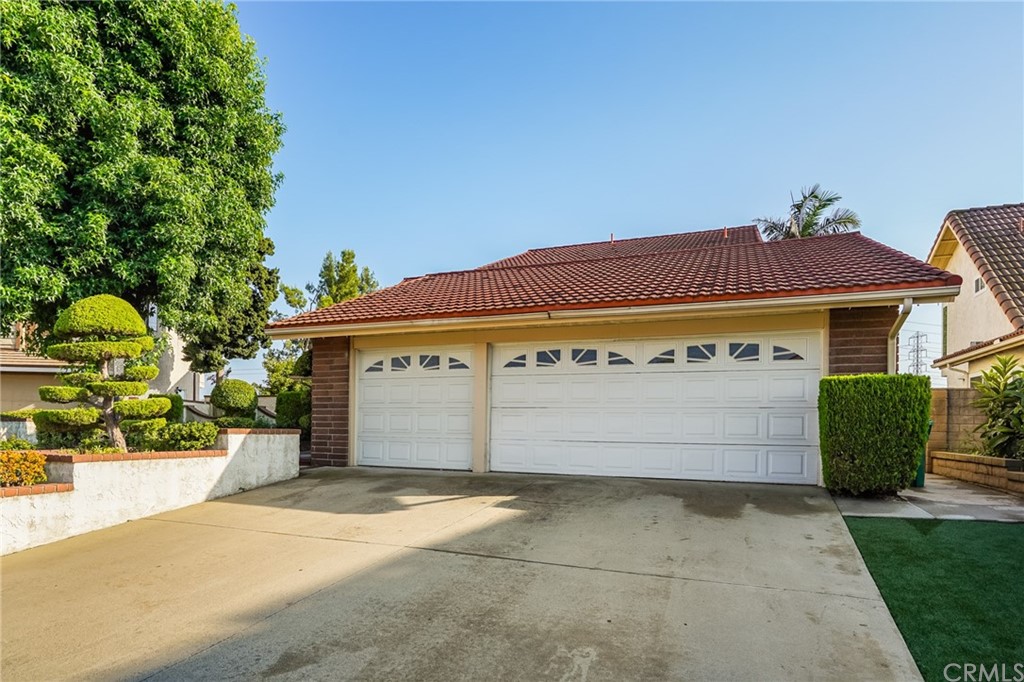 21626 Fairwind Lane Diamond Bar, CA 91765 - Photo 44 of 44 a front view of a house with a yard