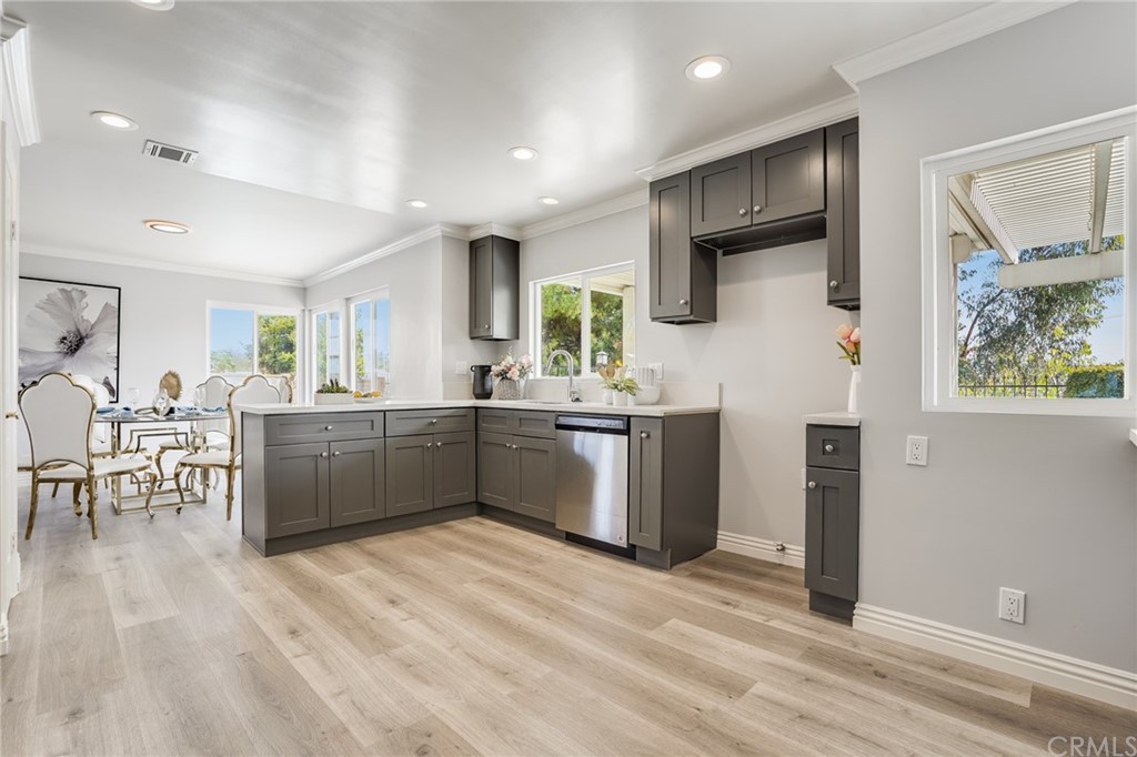 21626 Fairwind Lane Diamond Bar, CA 91765 - Photo 10 of 44 a dining room with furniture a window and wooden floor