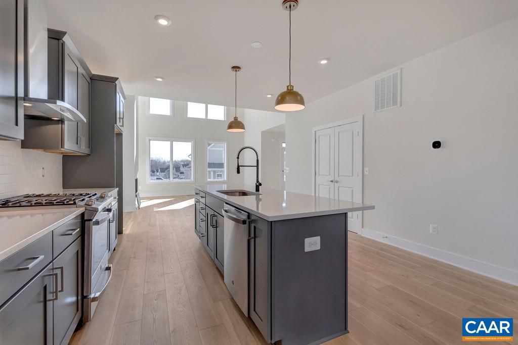 3254 Horizon Road Charlottesville, VA 22902 - Photo 11 of 32 a kitchen with stainless steel appliances granite countertop a stove and a sink