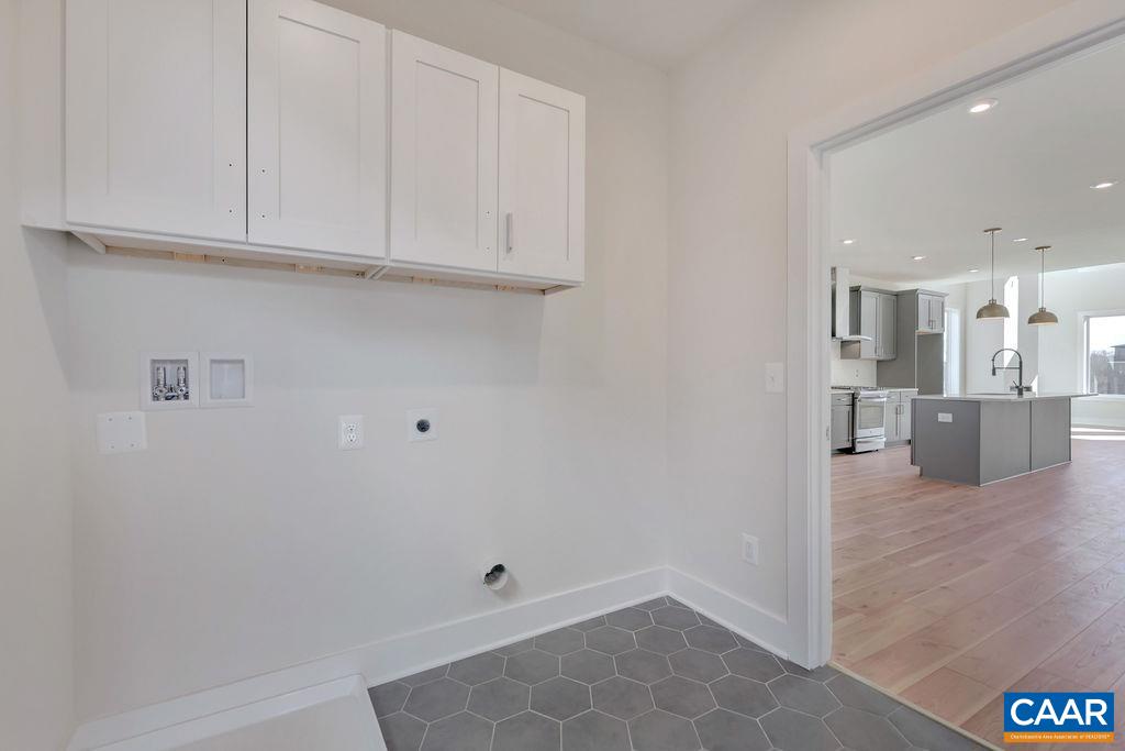 3254 Horizon Road Charlottesville, VA 22902 - Photo 15 of 32 a view of a kitchen with white cabinets