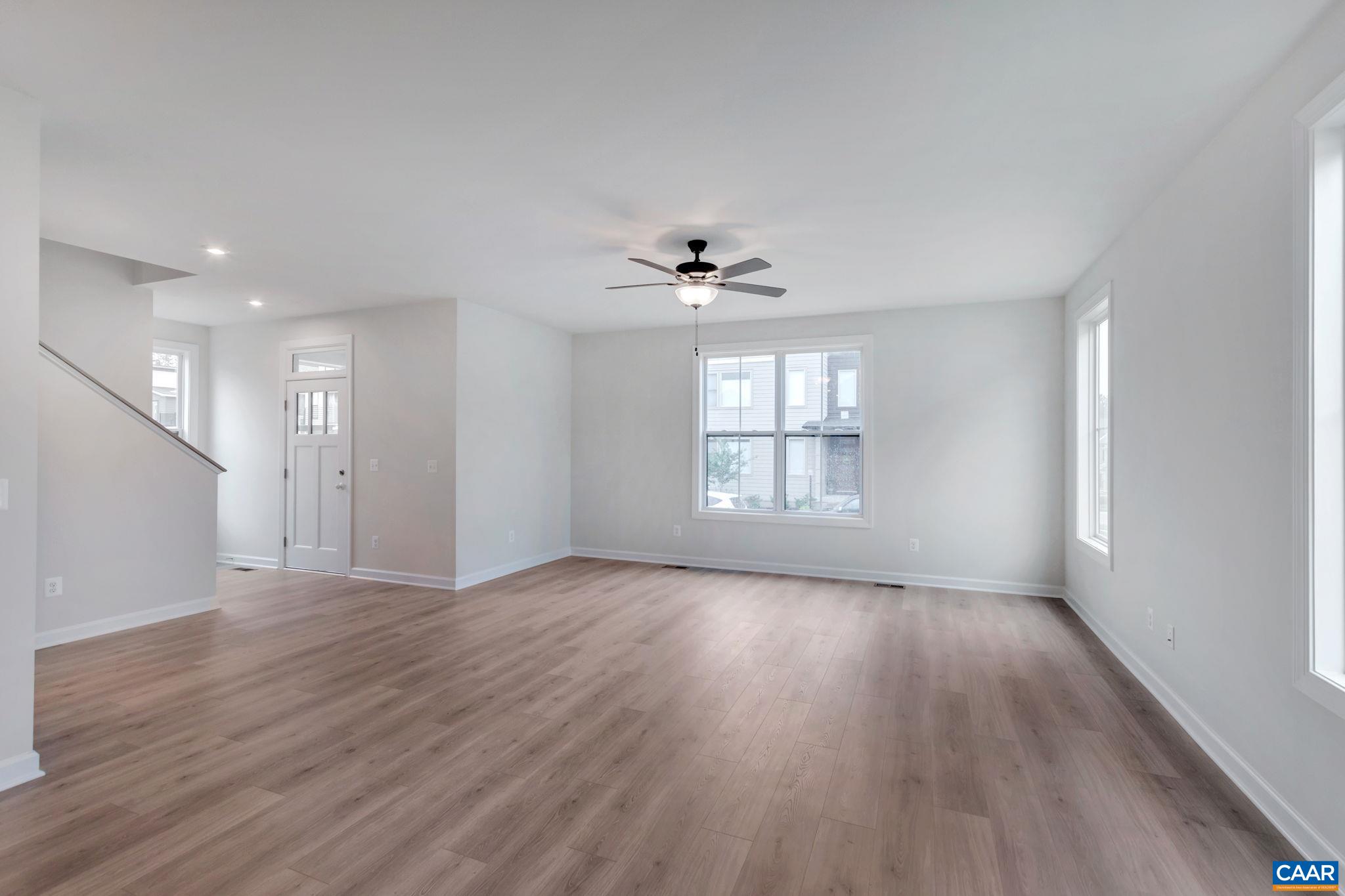 3254 Horizon Road Charlottesville, VA 22902 - Photo 7 of 32 a view of an empty room with a window and wooden floor