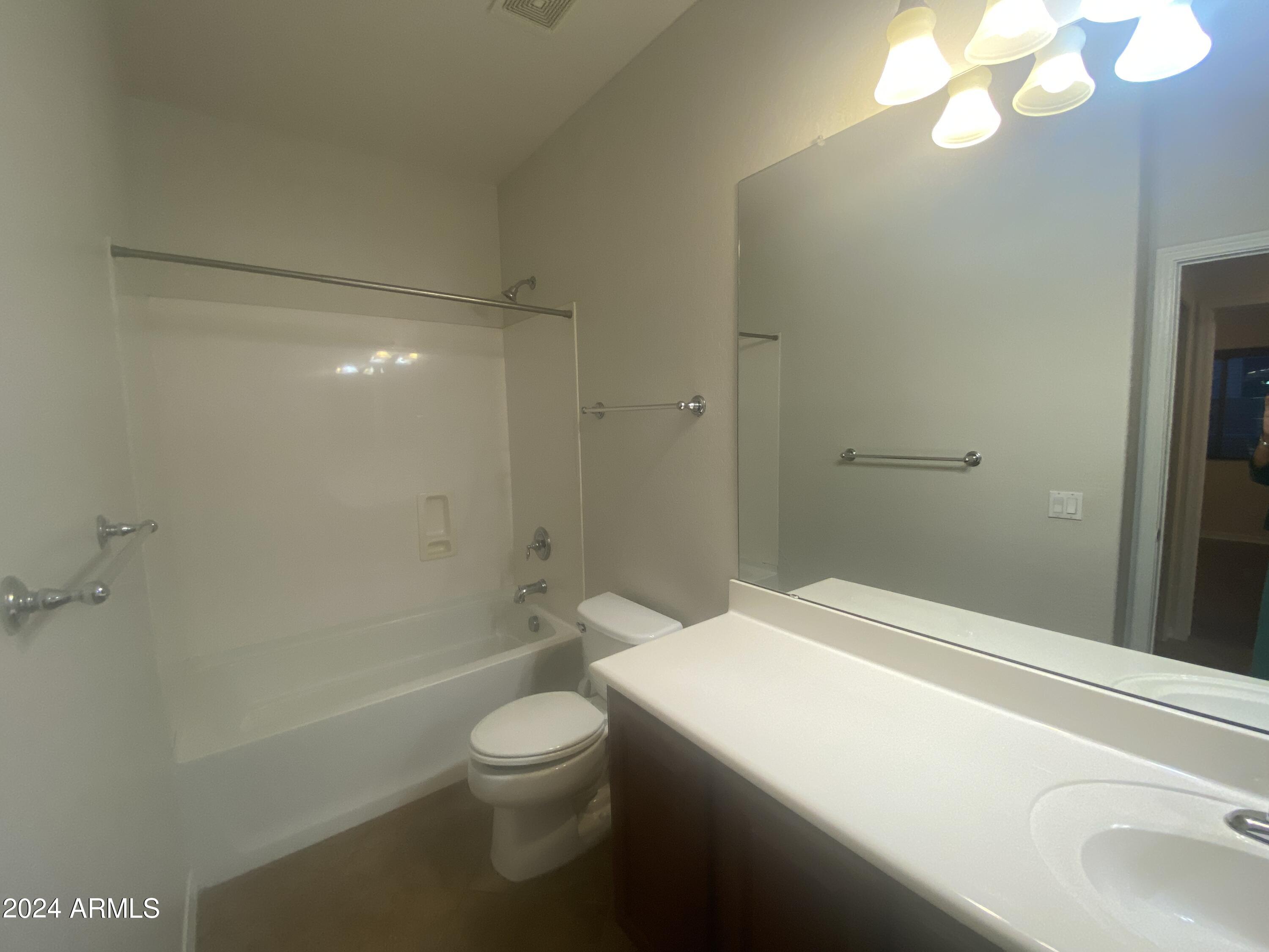 5230 West Red Bird Road Phoenix, AZ 85083 - Photo 12 of 26 a bathroom with a sink a toilet and shower