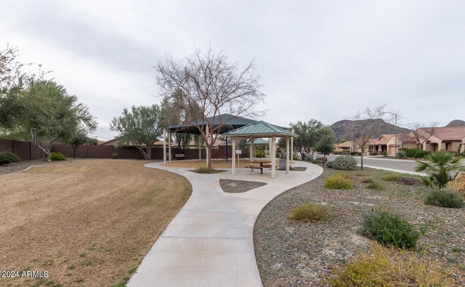 5230 West Red Bird Road Phoenix, AZ 85083 - Photo 26 of 26 a swimming pool with outdoor seating and yard