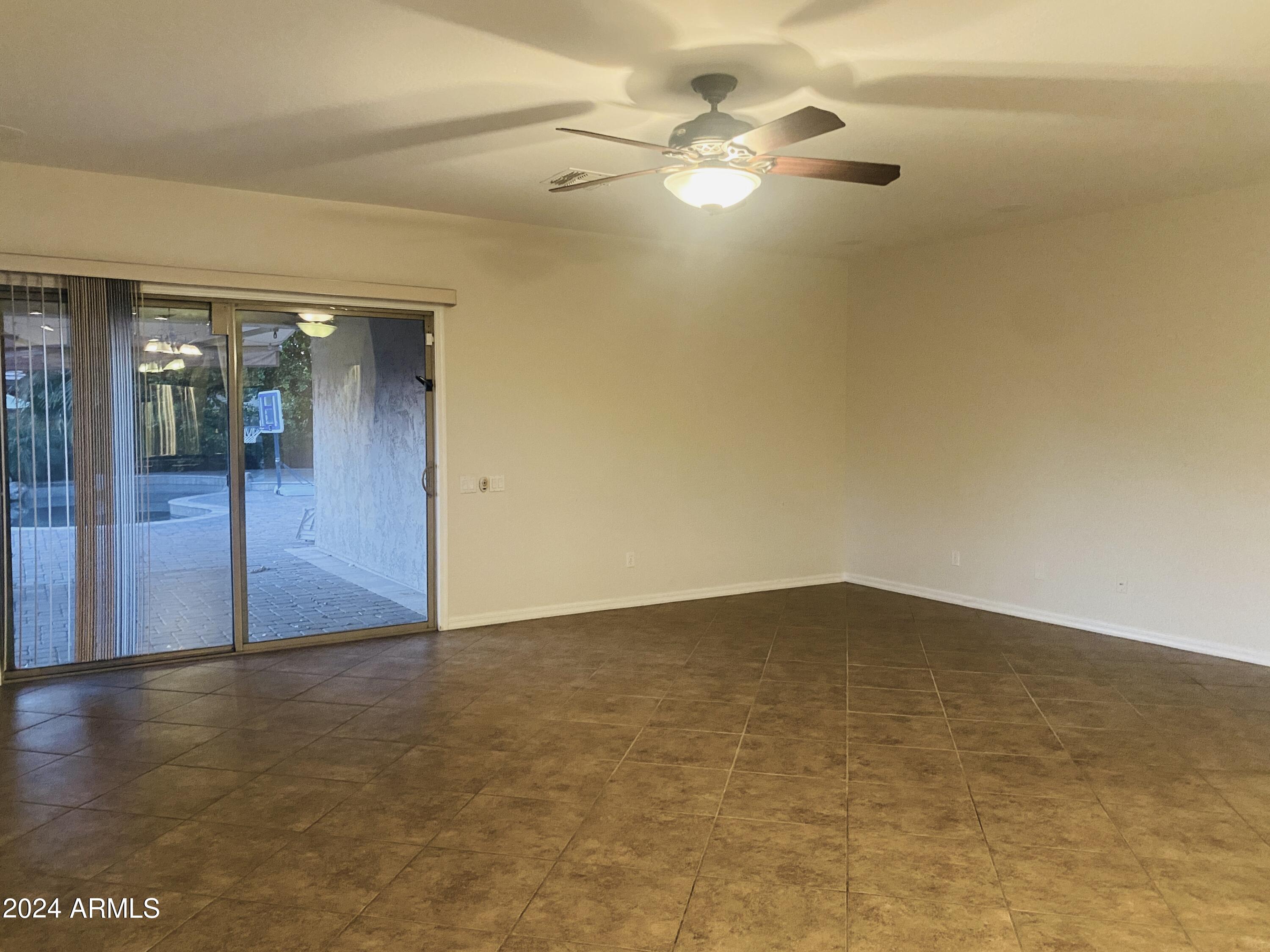 5230 West Red Bird Road Phoenix, AZ 85083 - Photo 5 of 26 wooden floor in an empty room