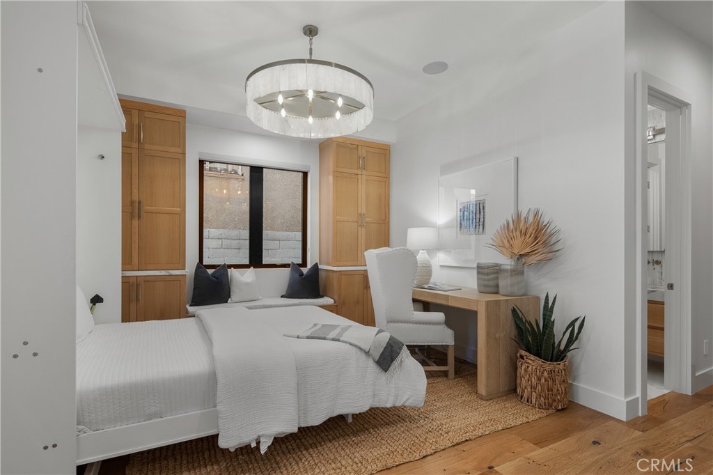 1004 Huntington Street Huntington Beach, CA 92648 - Photo 18 of 46 a bedroom with a bed and window