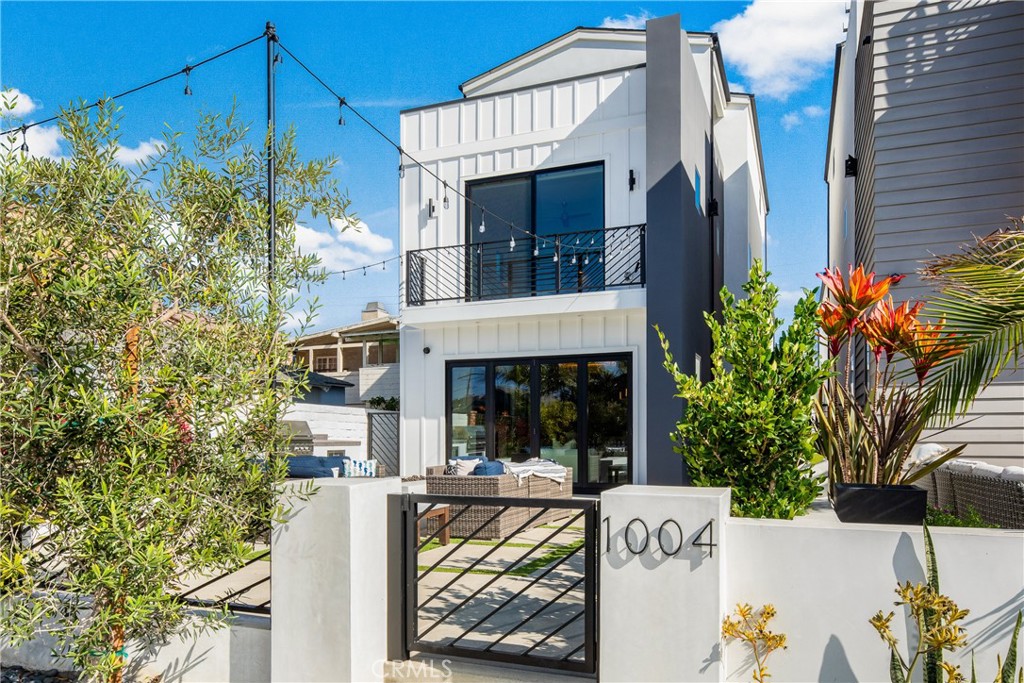 1004 Huntington Street Huntington Beach, CA 92648 - Photo 2 of 46 a view of house with outdoor space and porch