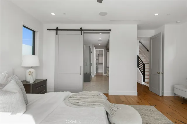 a large bathroom with a double vanity sink and a mirror