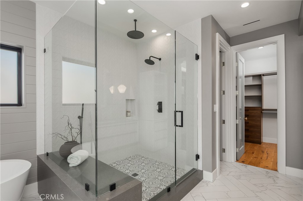 1004 Huntington Street Huntington Beach, CA 92648 - Photo 26 of 46 a bathroom with a shower sink and toilet