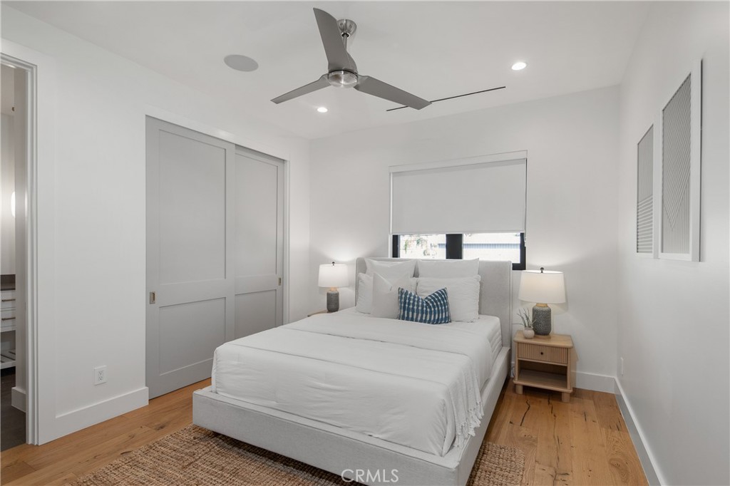 1004 Huntington Street Huntington Beach, CA 92648 - Photo 31 of 46 a bedroom with a bed and a night stand