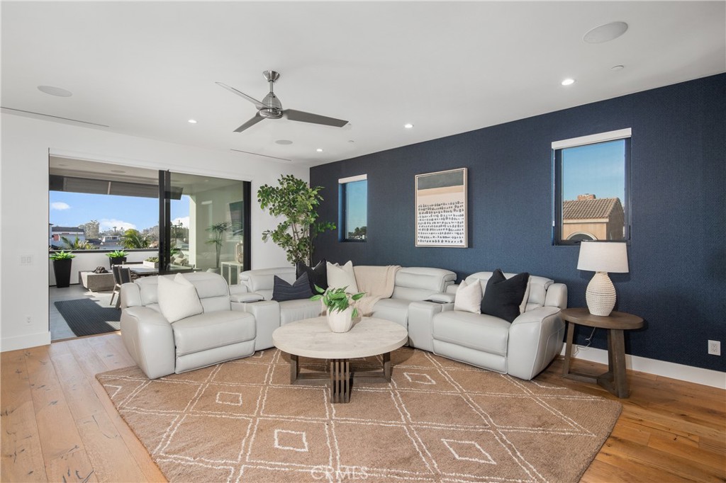 1004 Huntington Street Huntington Beach, CA 92648 - Photo 33 of 46 a living room with furniture and a large window