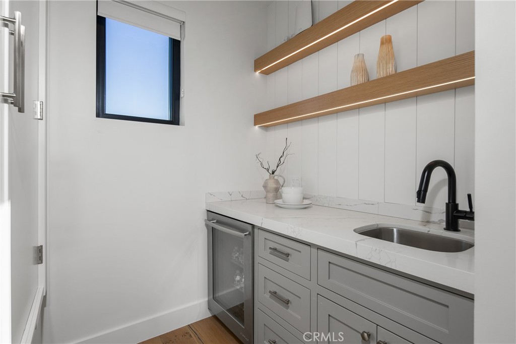 1004 Huntington Street Huntington Beach, CA 92648 - Photo 35 of 46 a close view of sink and tap